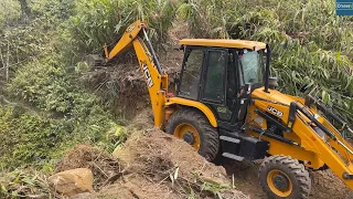 Mountain Top Narrow Road Building Cutting Steep Hillside with JCB Backhoe