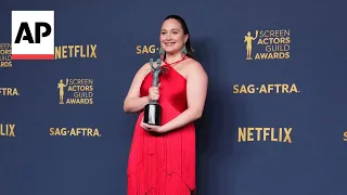 Lily Gladstone says the weight of her SAG Award win is "heavy - literally and figuratively"