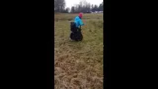 Segway Wheelchair AddSeat riding on a wet field