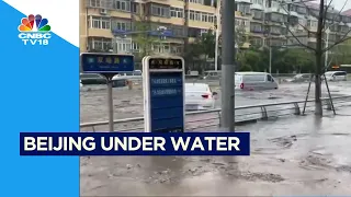 Beijing Under Water | Cars, Road Signs Washed Away Due To Heavy Rainfall | CNBC TV18