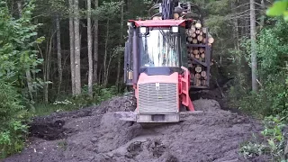 Logging with Valmet 840.3, difficult road, mud, skilled operator