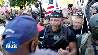 Black Lives Matter protesters clash with armed Trump supporters in Louisville and Rochester