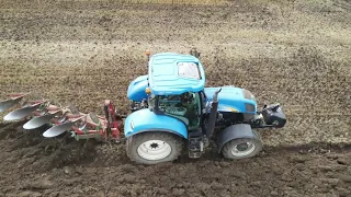 PLOUGHING A WHEAT STUBBLE TO PUT BACK INTO GRASS