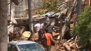 Rescuers work in Barra do Sahy, worst affected area by Brazil floods | AFP