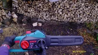 How to: Electric chainsaw cleaning blade chain drive housing and checking oil flow.