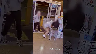 Bottle shop employee stacks while chasing shoplifters