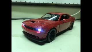 Frank's custom 2018 TorRed Dodge Challenger Hellcat diecast model with working lights