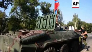 Pro-Russian rebels move APCs from Donetsk to nearby town