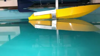 Foil assist boat towing tank test