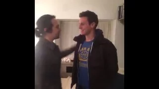 Lin-Manuel Miranda kissing Jonathan Groff