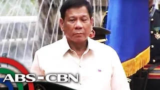 Duterte gets first military honors, ascends Malacañang