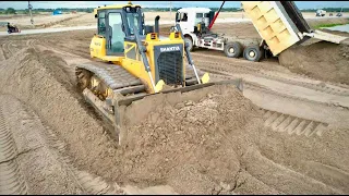 Best Land Filling Up Operator Bulldozer Pushing Sand In to The big lake!