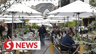 Sydneysiders hit gyms, pubs and department stores as lockdown ends