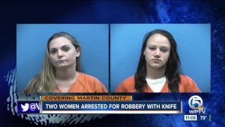 Two women arrested for robbery with knife