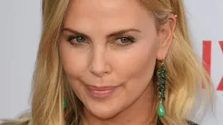 Charlize Theron denies she’s dating Brad Pitt on Ellen DeGeneres