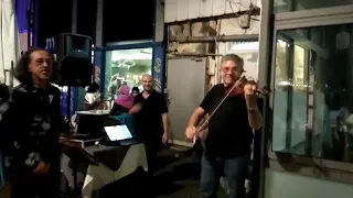 Shmuel from Clipli play the Violin at Jaffa Port.