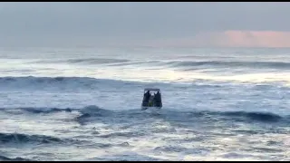 Ski-boat flips off Shelly Beach