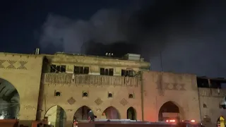 Smoke rises over Arbil's Qaysari bazaar after a fire breaks out | AFP