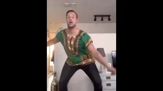 white man dancing african dance meme
