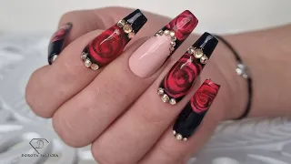 Valentine's Day Nails. Red and black nails with blooming gel rose.