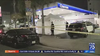 Man found dead with assault rifle next to his body in downtown L.A. parking lot