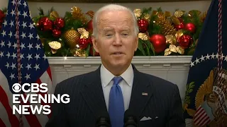 Biden says Omicron variant is "not a cause for panic"