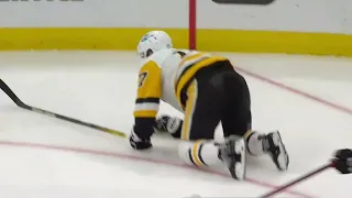 Connor Clifton big hit on Bryan Rust