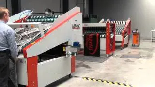 Rolling Textile carpets with the RM18 automatic output.