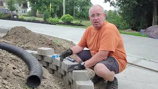 DIY Curved retaining wall project for a flower bed extension