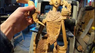 Repairing a broken wooden sculpture