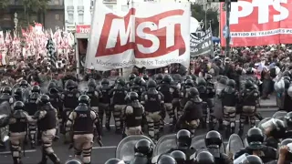 Police face protesters outside Argentine Congress after Milei's reforms clear initial hurdle | AFP