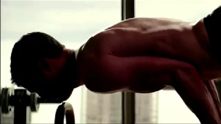 Shirtless Christian Grey works out