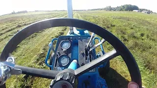 Ford 9600 tractor working hard mowing hay