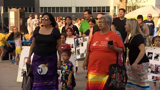 Candlelight vigil for 27-year-old mother held at Regina city hall encampment