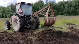 Traktorin ojankaivuri kuuskytluvulta