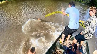 MONSTER FISH in a FLOODED CREEK! (BIGGER THAN WE ARE!!)