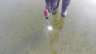 checking ice thickness on lake Wabamun