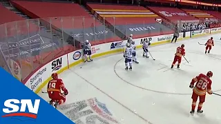 Jake Muzzin Flips Puck At Matthew Tkachuk After Final Horn Causing Scrum Between Leafs & Flames