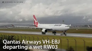 Wet Departure - Qantas Airways (VH-EBJ) departing RW03 at Perth Airport.