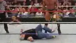 Randy Orton Hits Dusty Rhodes With A Cowbell