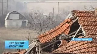 Life on Fronline: Residents in shell-shocked east Ukraine village rely on soldiers for food supplies