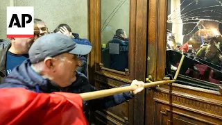 Police in Serbia block protesters from entering Belgrade city council building