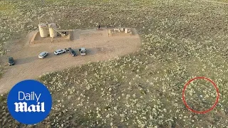 Drone shows body of wife at site where Watts dumped bodies