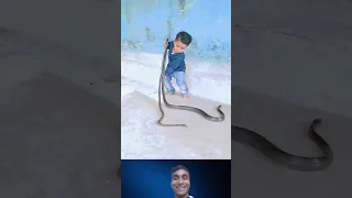 😱 omg | This child is playing with a snake 🔥💯💥 #shorts