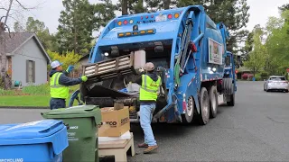 Crushing Bulk Waste in an Autocar ACX Rear Loader