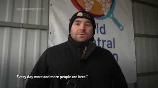 Aid volunteers feed Ukrainians in frontline villages