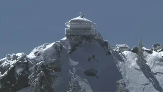 House on top of mountaintop covered in snow in SoCal