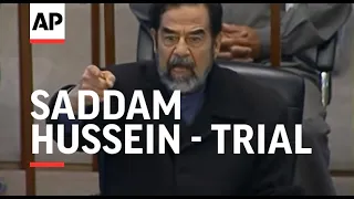 Saddam, co-defendants forced to attend latest session of trial