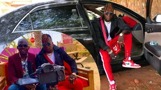 FOXY BOY EXPOSES HIS NEW CAR WORTH 30 MILLIONS SHILLINGS.