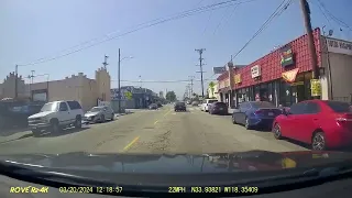 Idiot driver makes left turn from far right turn lane going opposite lane